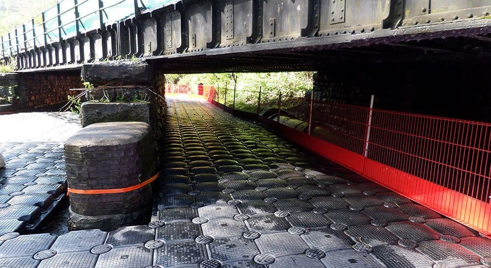 Amco Rail Aberdare pontoon under a bridge