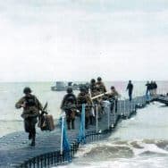 Military running across a pontoon bridge