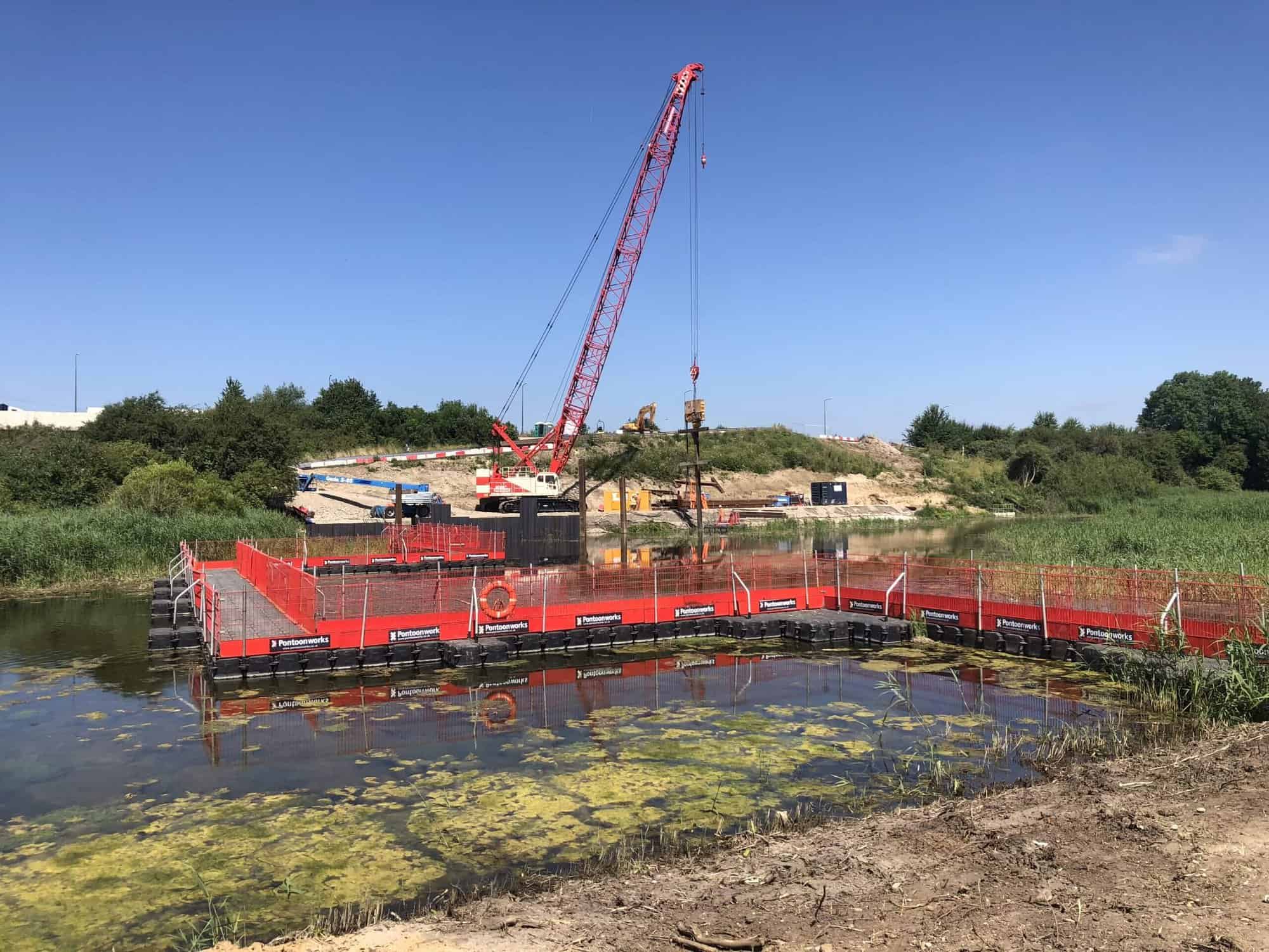 Walk to work pontoon for personnel at bridge construction site